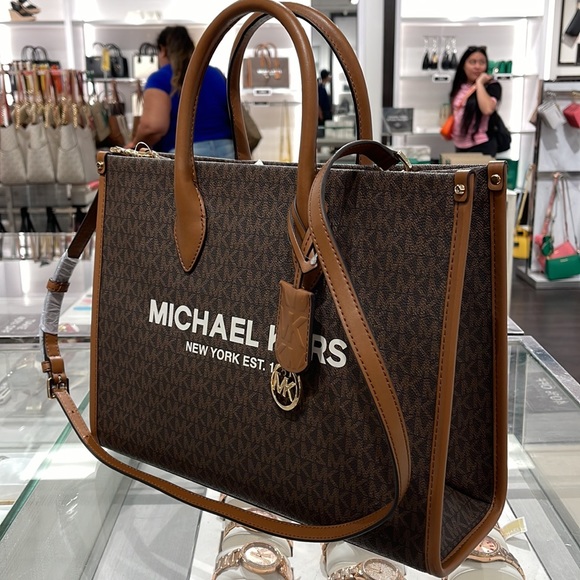Michael Kors "Mirella" MD EW Tote Brown Shoulder Bag - 35F2G7ZT2B
Brown
NWT - Picture 3 of 16